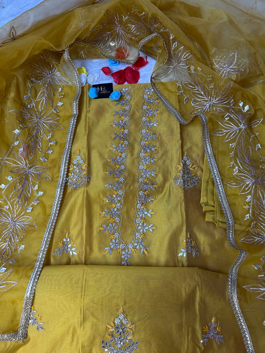 YELLOW CHANDERI SILK SUIT WITH FLOWER AND CHAMKI WORK